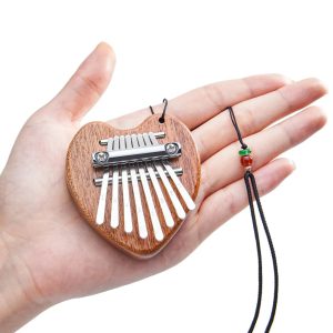 Découvrez comment le Mini Kalimba 8 Touches ouvre un nouvel horizon musical pour les enfants