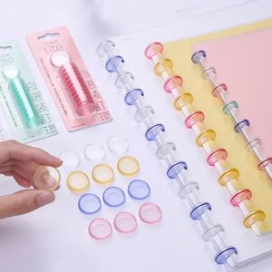 Réinventez vos carnets avec style : La boucle de reliure champignon au design cœur