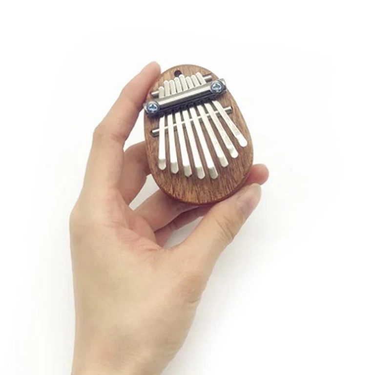 Redécouvrez la musique avec le Mini Kalimba 8 Touches : Un compagnon sonore et portable pour toutes vos inspirations