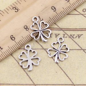 Portez la Chance et l’Élégance: Découvrez le Lot Charmes Trèfle Quatre Feuilles - Bronze Tibétain & Argent Antique