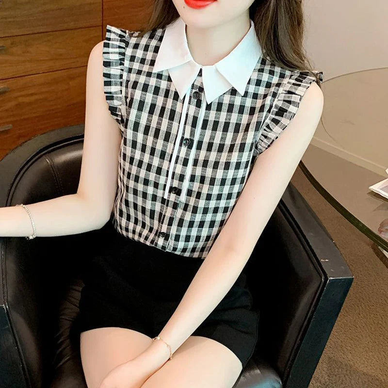 Embrassez l'Été avec Style: Le Chemisier Sans Manches à Carreaux Élégant qui Redéfinit la Mode Décontractée