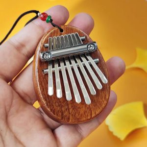 Découvrez l'Alchimie des Sons avec le Mini Kalimba 8 Touches