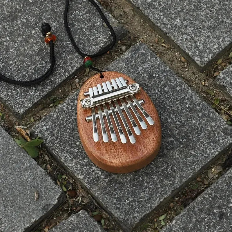Découvrez le Mini Accordéon 8 Touches : L'Art de la Musique à Portée de Main