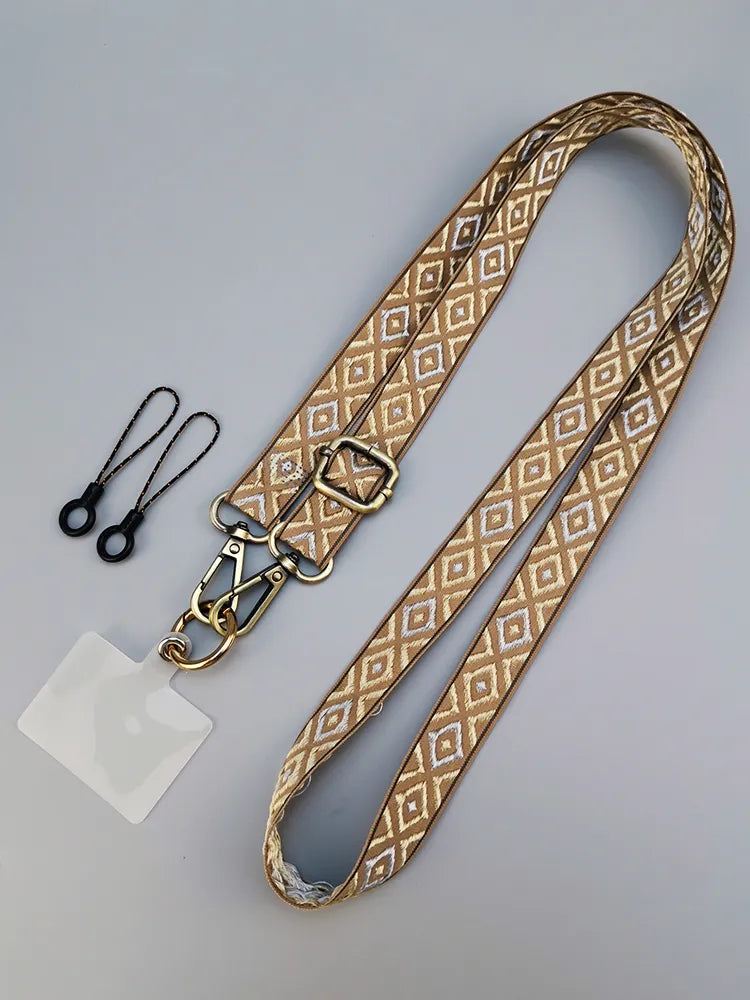 Un accessoire vintage pour une sécurité moderne: la lanière téléphone portable bandoulière rétro