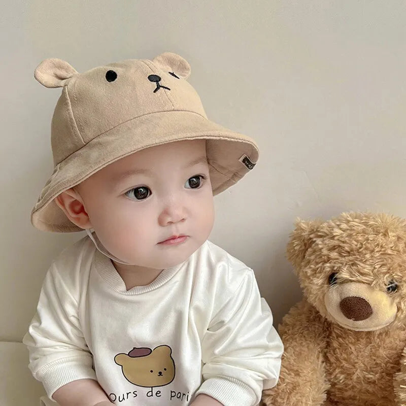 Découvrez le Must-Have de l'Été : Le Chapeau Seau Bébé Ours en Coton avec Oreilles