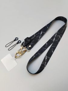 L'alliance parfaite du style et de la sécurité : adoptez la bandoulière en marbre pour votre téléphone portable