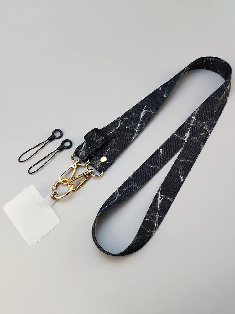 L'alliance parfaite du style et de la sécurité : adoptez la bandoulière en marbre pour votre téléphone portable