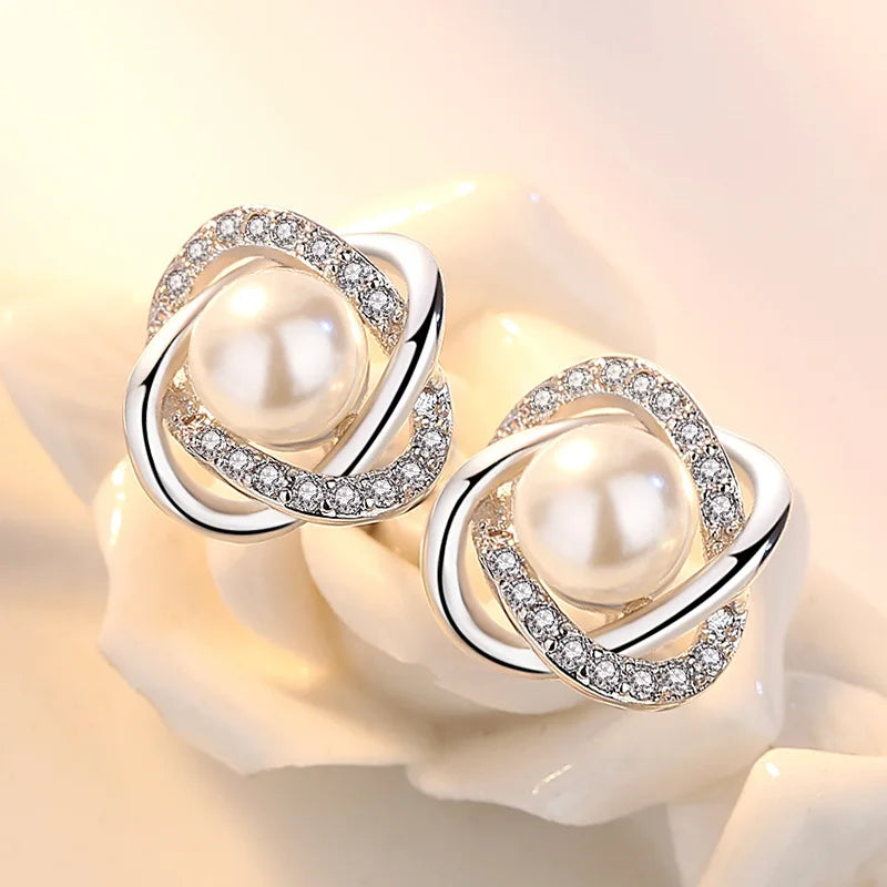 La touche raffinée pour sublimer vos looks : boucles d'oreilles en argent 925 avec zircon et perle